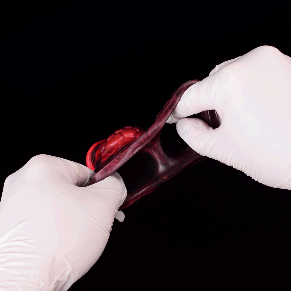 Herman Blood-Red Penis Extender – Scaled & Vibrating